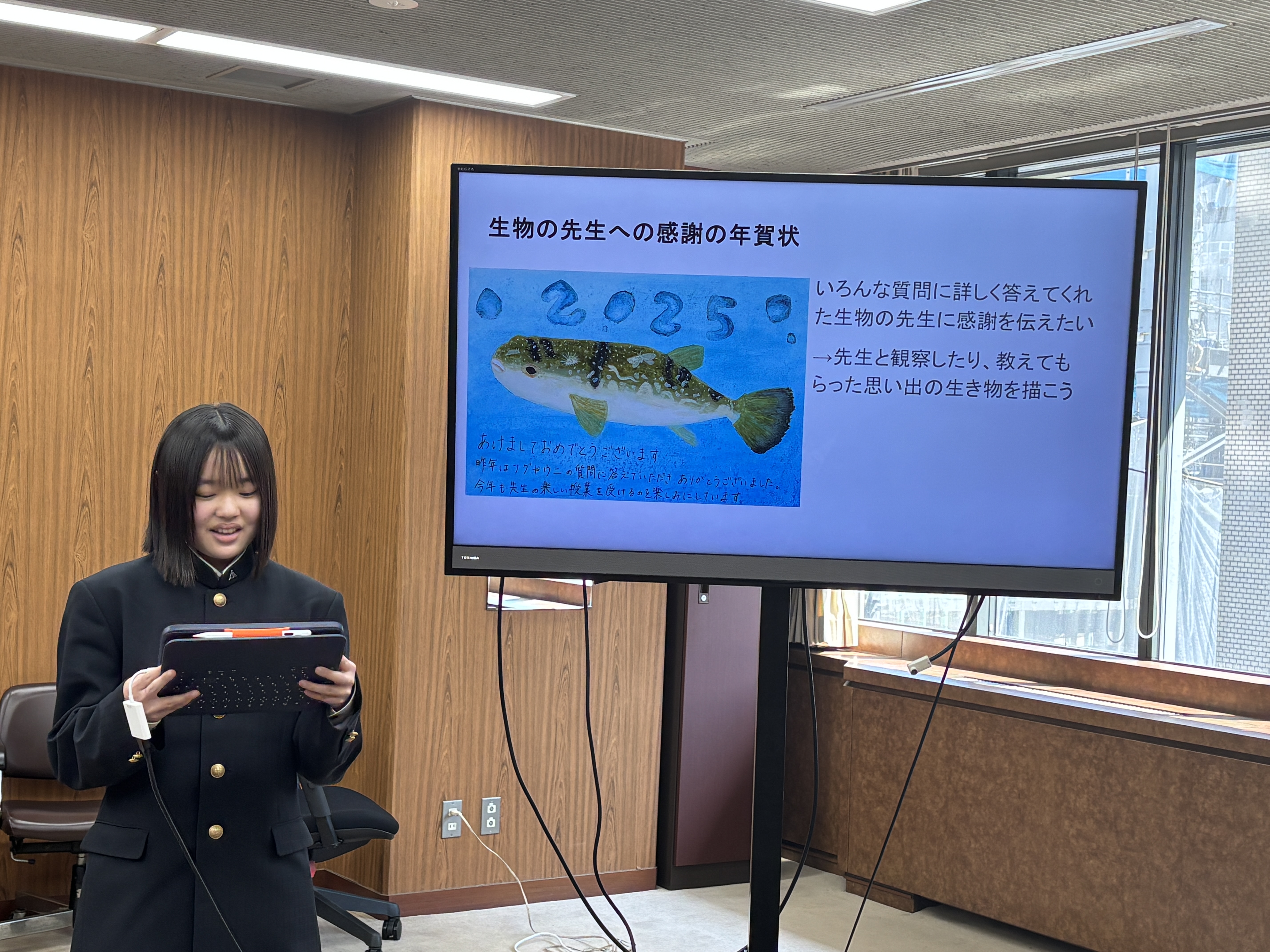 説明する佐藤さん