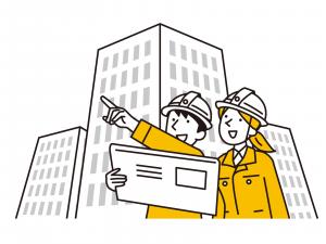 建物の前に立つ人